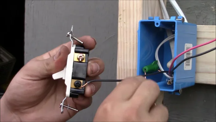 Connect the two traveler wires to the bronze terminals of the three-way switch (order doesn't matter).