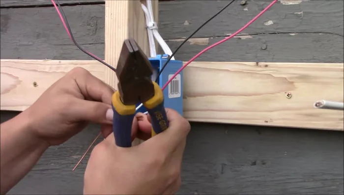 Connect neutral wires together and place them in the back of the box.