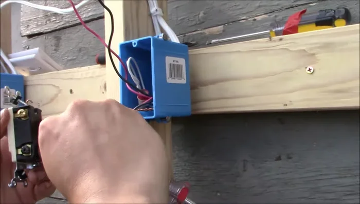 Connect the two outgoing traveler wires to the bronze terminals of the four-way switch (order doesn't matter).