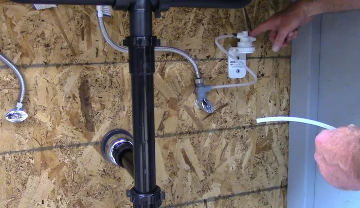 Align the filter with the bracket arrow and twist to lock it into place.