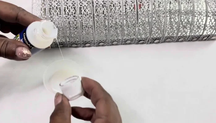 Add small gems using a skewer and adhesive.