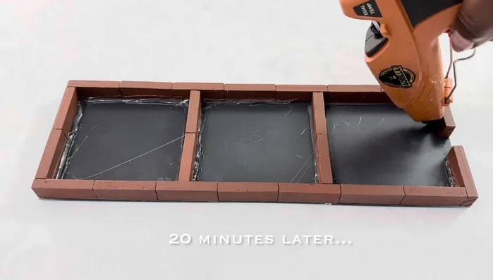 Paint the wood pieces with two coats of silver metallic paint.