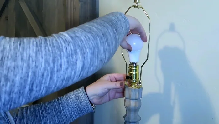 Attach the lampshade (optional).