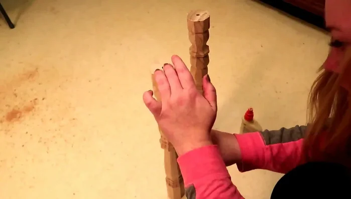 Glue the two drilled table legs together and let them dry completely.