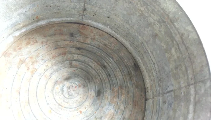 Repair any holes or damage: Use a hammer to smooth out rough edges before sanding.