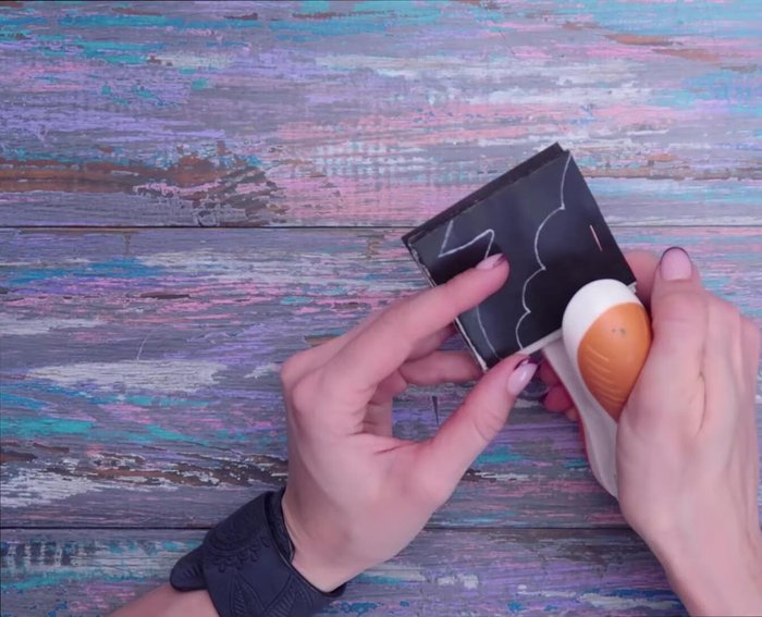 Cut out the character along the drawn lines.