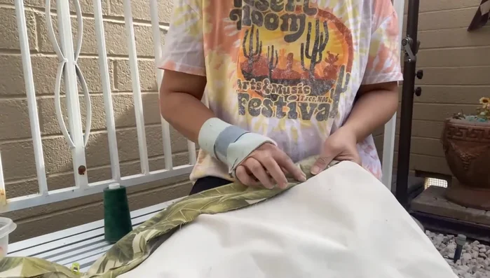 Cut away excess fabric and tuck in raw edges before sewing the final seam.