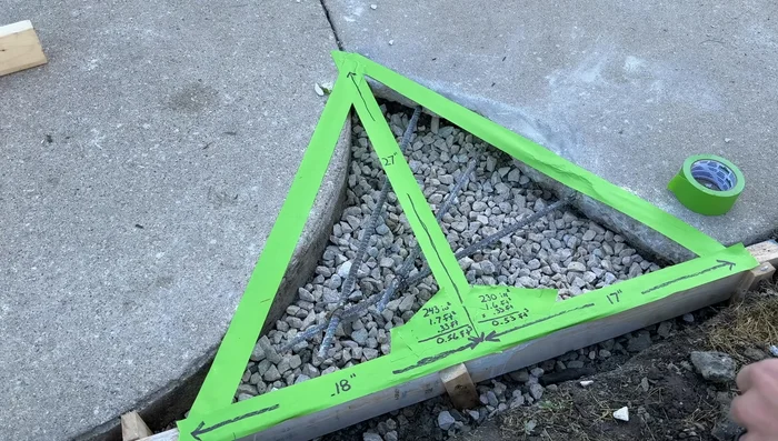 Apply concrete adhesive to the existing concrete where the new patch will bond.