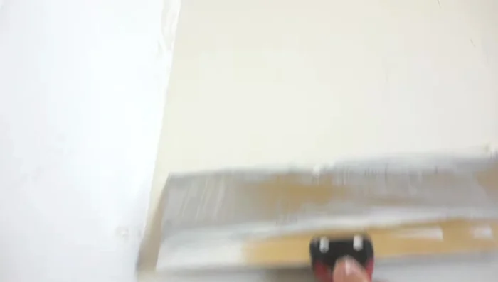 Apply a second coat if necessary, focusing on any remaining imperfections.