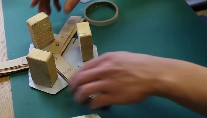 Package the coasters in recycled paper packaging, securing with cellulose adhesive tape.