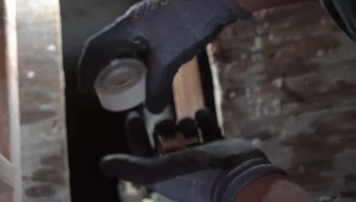 Install a three-quarter inch male adapter to the remaining galvanized pipe, using plumber's tape to ensure a watertight seal.