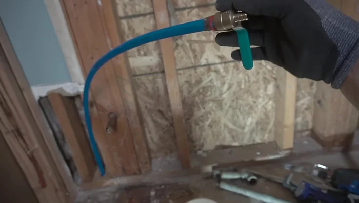 Restore the subfloor and wall covering.