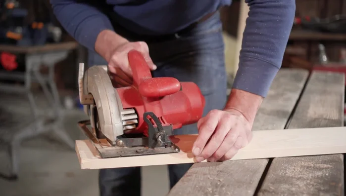 Measure and cut another 1x6 pine board for the back support and screw it onto the bench.