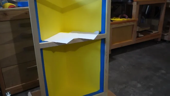 Apply a clear polyurethane finish to the adjustable shelf and top.