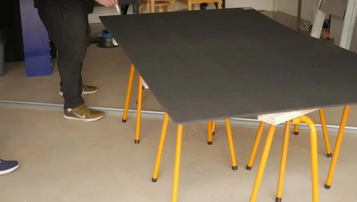 Glue magnets to panels.