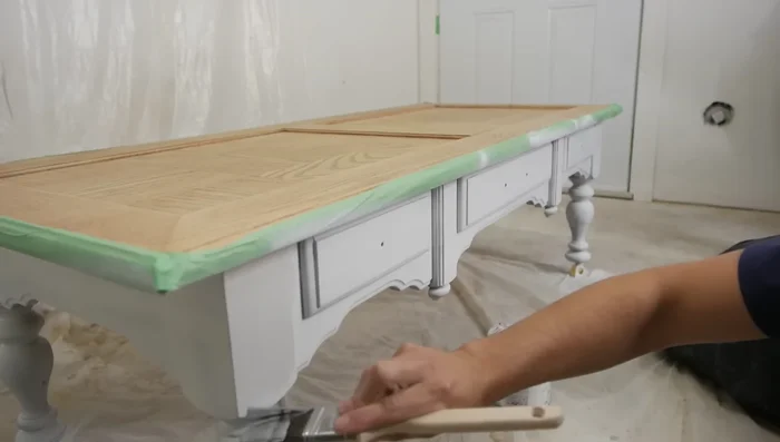 Apply two coats of paint with a brush, sanding lightly between coats with 220 grit sanding sponge.