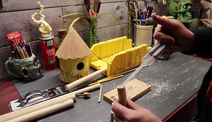 Create and attach the seam: Use tape and devcon to create a seam around the funnel top.