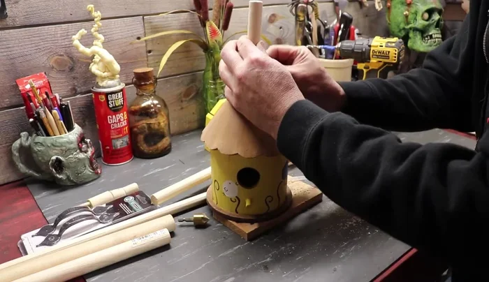 Create and attach the seam: Use tape and devcon to create a seam around the funnel top.