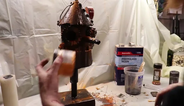 Final touches: Apply a clear coat to seal the birdhouse and protect it from the elements.