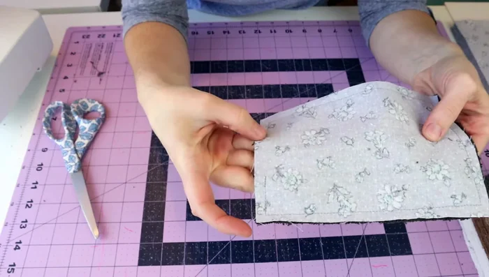 Trim the corners: Trim the excess fabric from the corners to reduce bulk and prevent fraying.