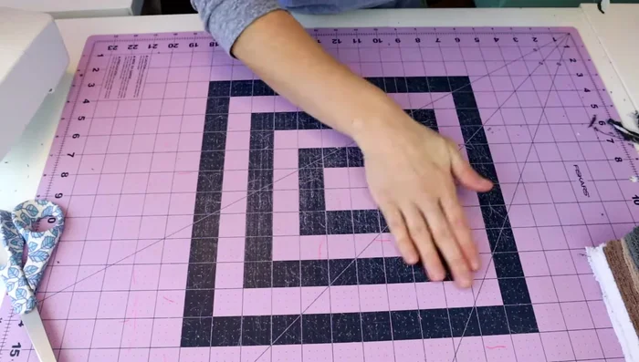 Cut threads: Trim away the excess threads from the front and back of the finished paper towel.