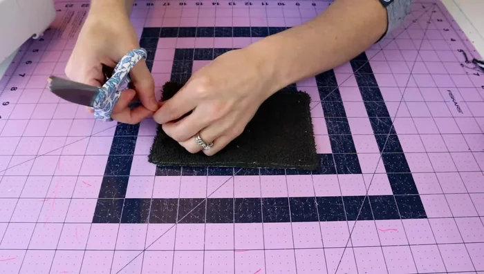 Cut threads: Trim away the excess threads from the front and back of the finished paper towel.