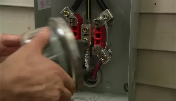 Install the meter and cover.