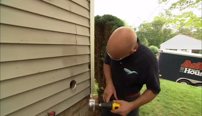 Secure the meter socket to the house.