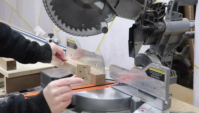 Cut angled cuts for the legs and aprons using a miter saw.