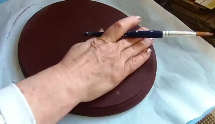 Repeat distressing: Repeat the distressing process on the sides of the plaque.