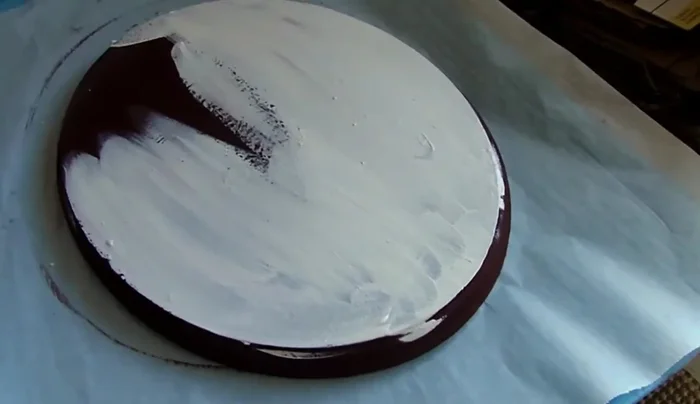 Repeat distressing: Repeat the distressing process on the sides of the plaque.