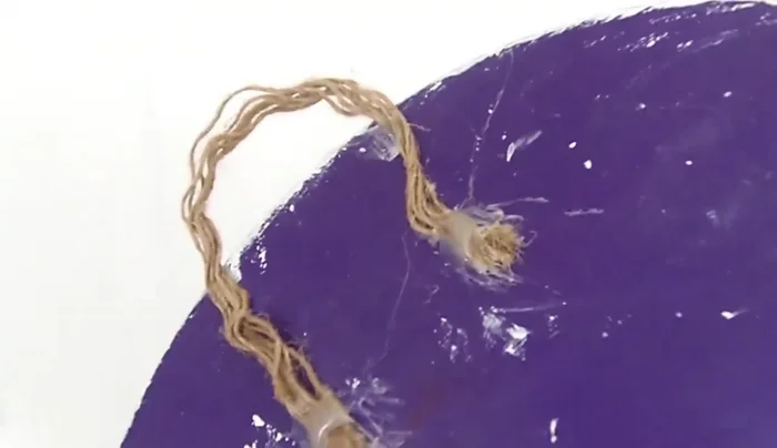 Hang the sign: Use 3M Command Strips or nails to hang the plaque on your door.