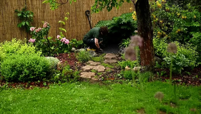 Install the solar pump in the bottom vessel, covering it with landscape fabric to prevent debris.