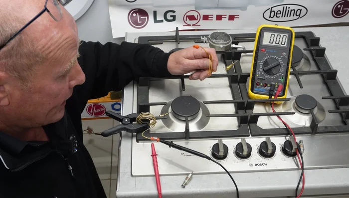 Heat the thermal couple tip with a flame.