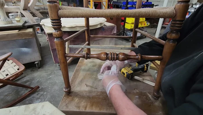 Apply a touch-up coat of varnish or lacquer.