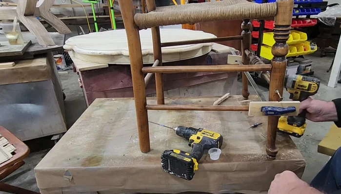 Apply a touch-up coat of varnish or lacquer.