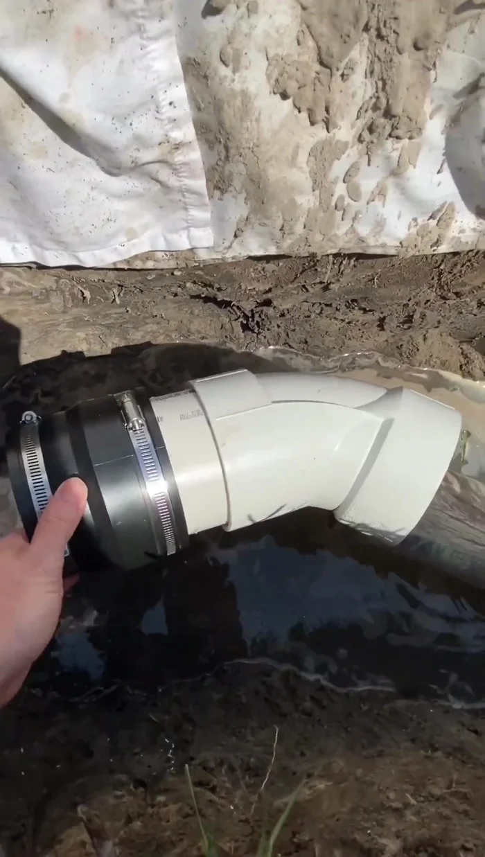 Apply PVC cement and glue the new elbow and pipe sections together. Ensure the clamps are oriented correctly before assembly to allow for tightening.