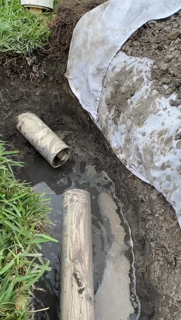 Acquire the necessary parts. Note that sewer lines use thin-walled pipe, different from standard pressure PVC. You'll need a short section of 4-inch PVC pipe, a 45-degree elbow (thin-walled sewer pipe is preferred but full-thickness is usable; cut in half and glued), and tapered boots (4x4) with bands on both sides.
