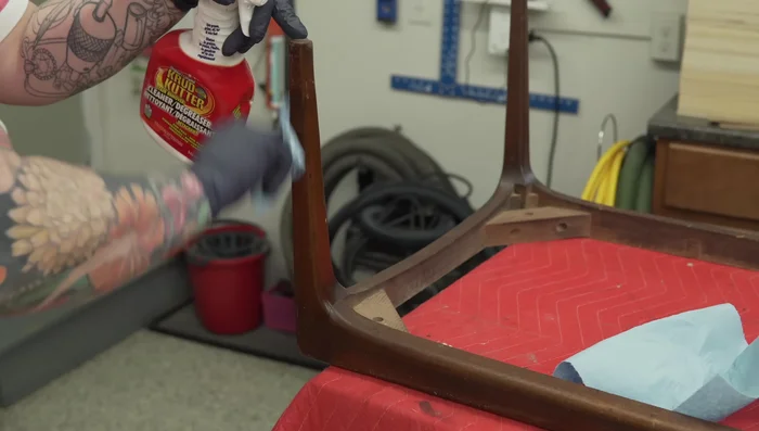 Clean and restore the base of the coffee table.