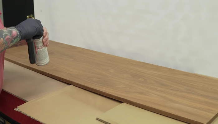 Apply pre-catalyzed lacquer in multiple thin coats.