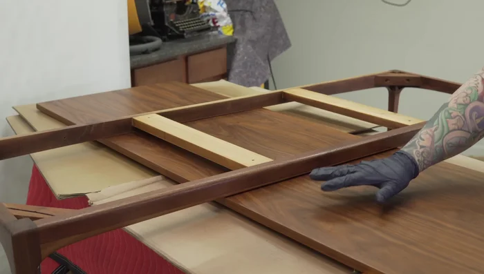 Apply pre-catalyzed lacquer in multiple thin coats.