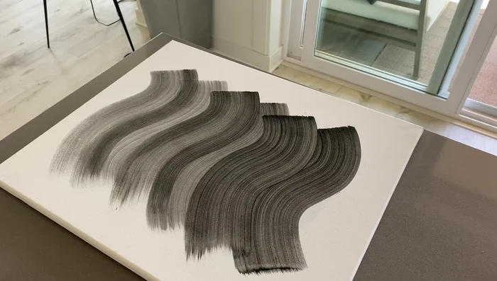 Add x-shaped glass wall vases with pothos plants.