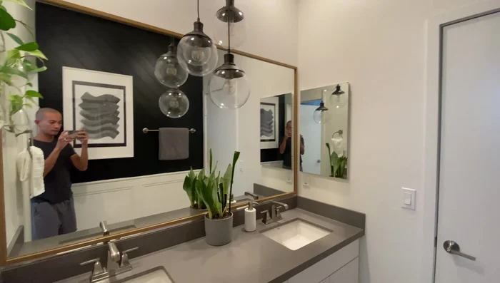 Install pendant lights above the sinks (requires electrician).