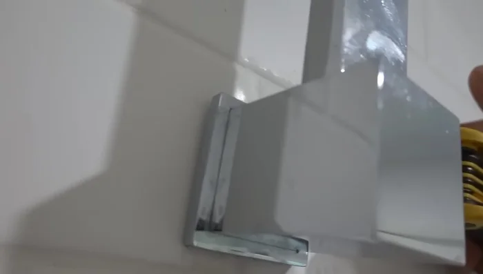 Inspect the arm for the restrictor. If not found, proceed to the next step.