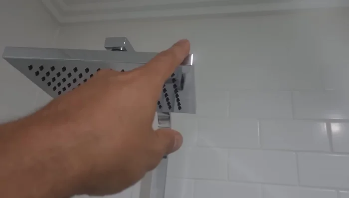 Identify the shower head type and restrictor location. The restrictor might be in the shower head itself, on the arm, or behind the shower head body.