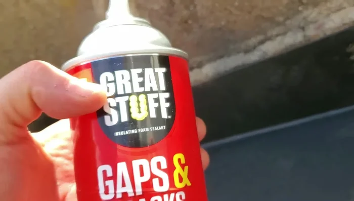 Trim excess expanding foam, leaving a cavity to be filled with bondo.