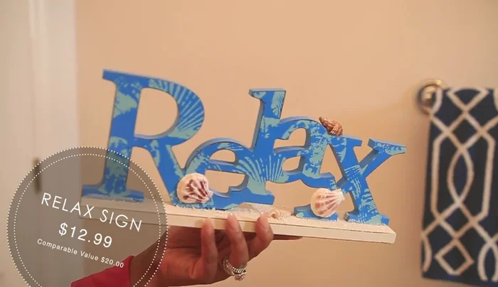 Add the coral reef decoration above the toilet.