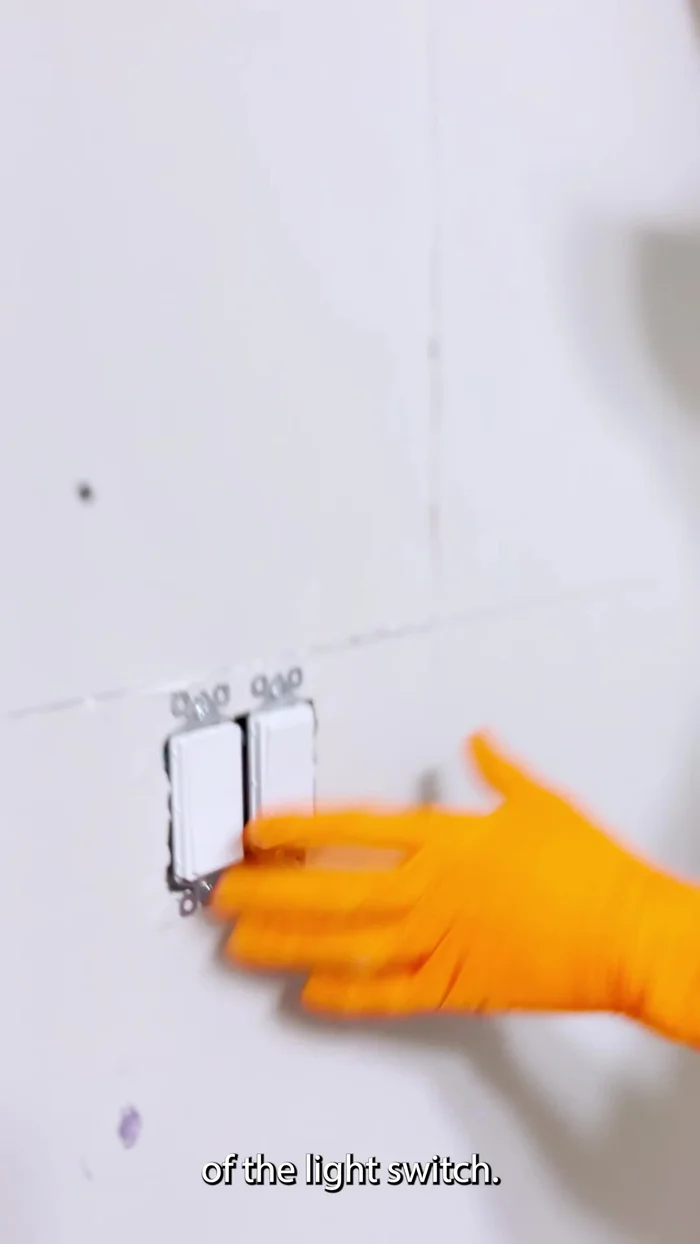 Prepare the edges of the damaged drywall by using a razor knife to cut the face paper at a 45-degree angle for a clean, smooth surface.