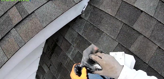 Make additional cuts to ensure the flashing fits snugly and covers the damaged area completely.