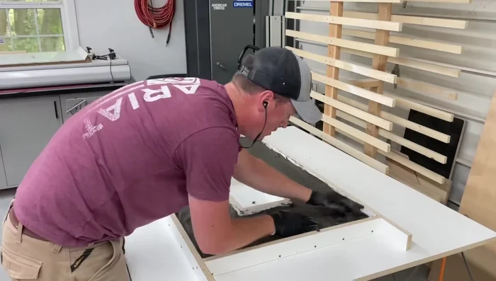 Cover the concrete with plastic to retain moisture during curing.